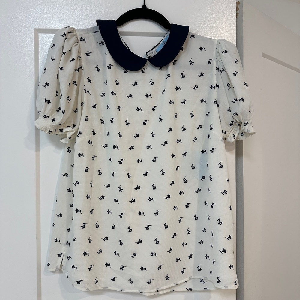 CeCe White and Black Ruffled Blouse with Peter Pan Collar
